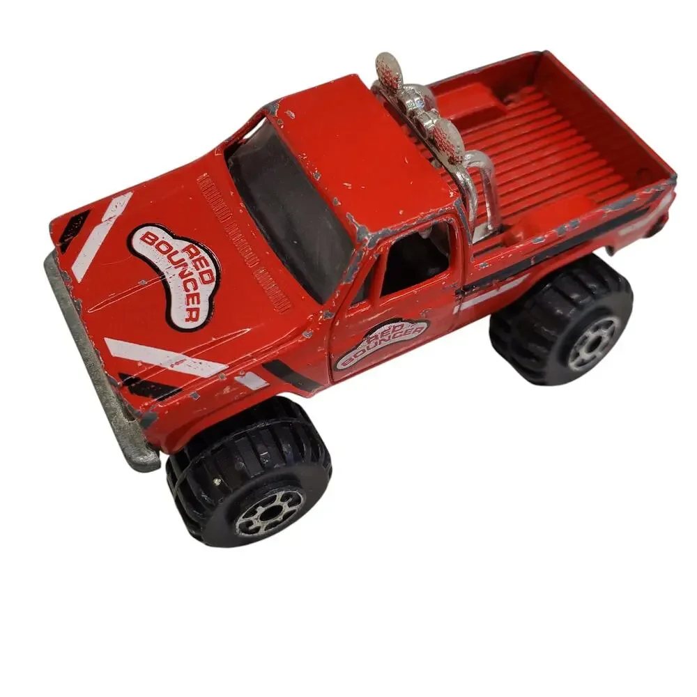 Road Champs GMC High Roller Red Bouncer 1982 Diecast Truck 1/64 Scale